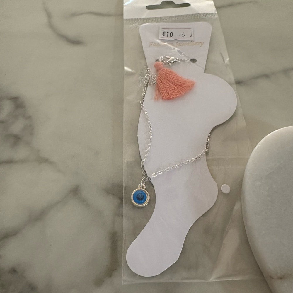 Silver Anklet with Pink Tassel and Blue Evil Eye Blue Charm